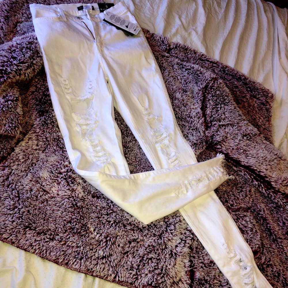White high-waist fashion nova jeans with cute rips